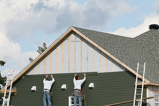 Professional Siding Installation technician working in Hebron, PA